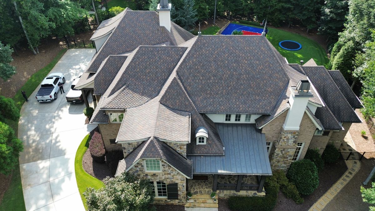 Front drone overview of home before CertainTeed Presidential Autumn Blend roof replacement