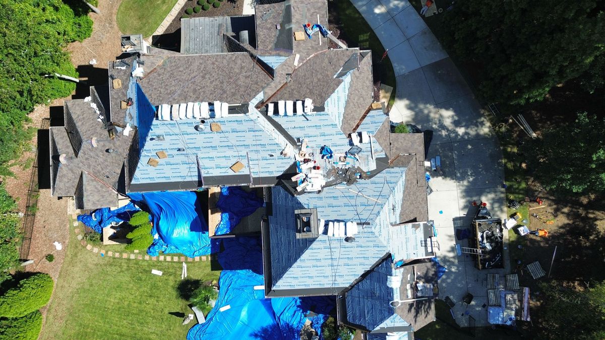 Aerial overview of Presidential Shake roof nearing completion