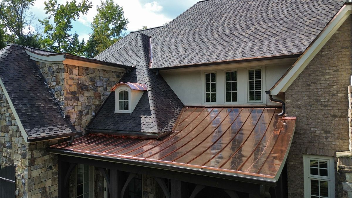 Custom copper work on front elevation during Presidential Shake installation
