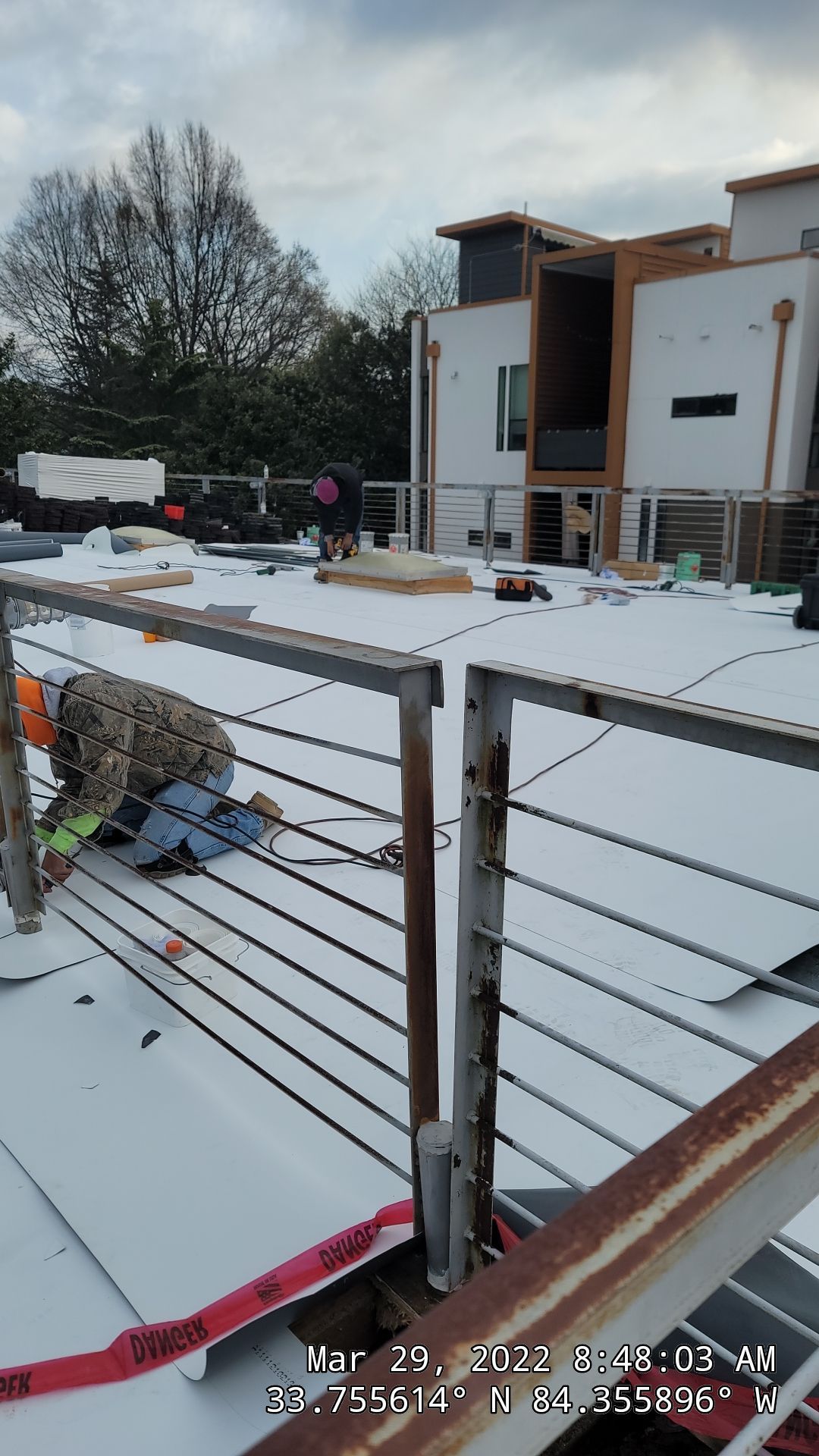 TPO roof installation documentation — paver system layout in progress