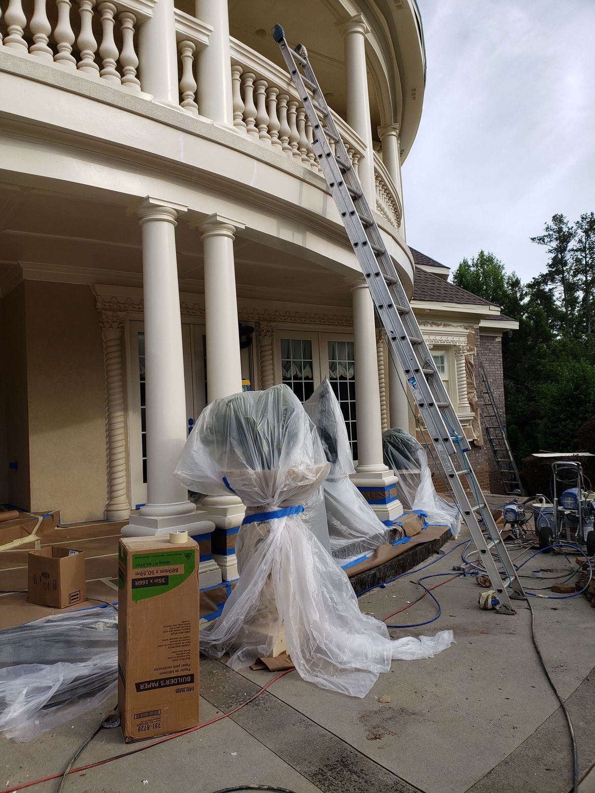 Mission Brown shingle installation progress on estate home