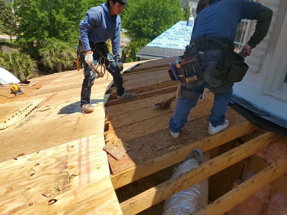 Custom copper dome installation progress on estate roof