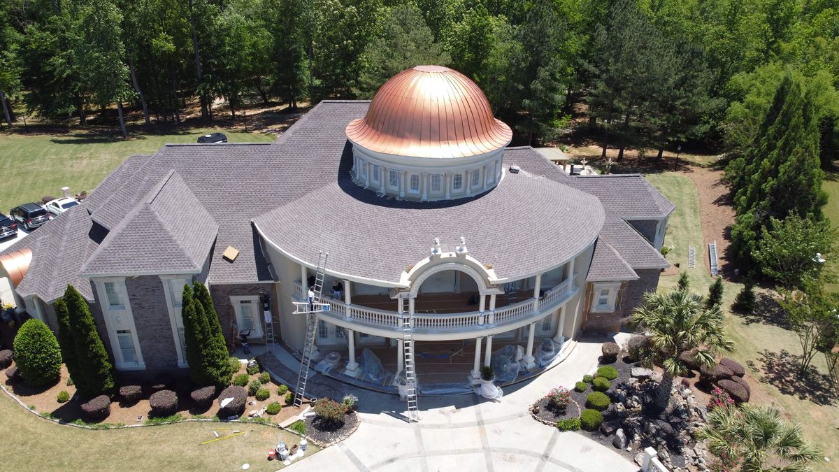 Custom copper work detail on estate roof replacement