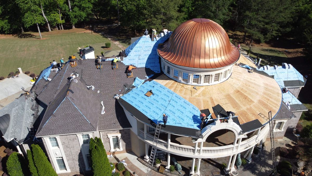 Estate roof — copper gutter and downspout installation