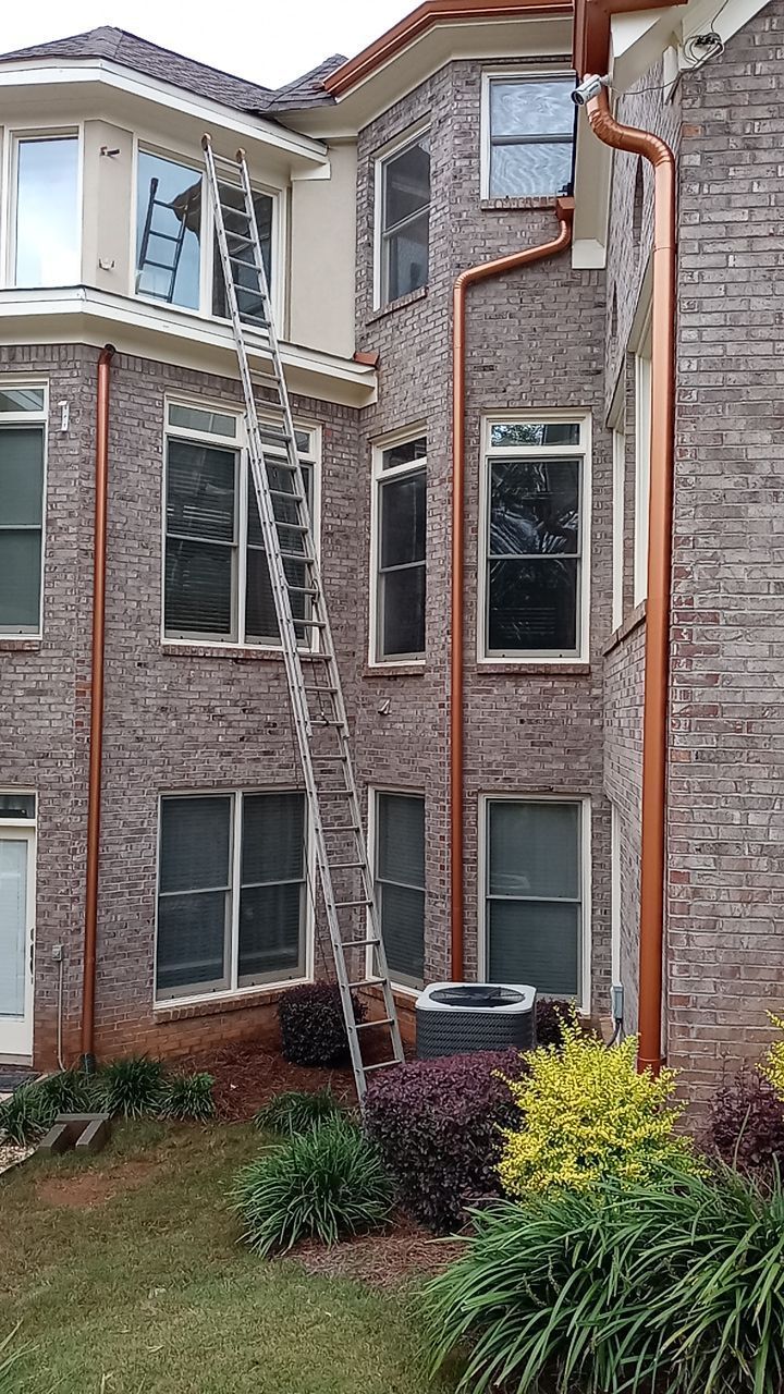 Aerial view of estate roof — Mission Brown shingles mid-installation
