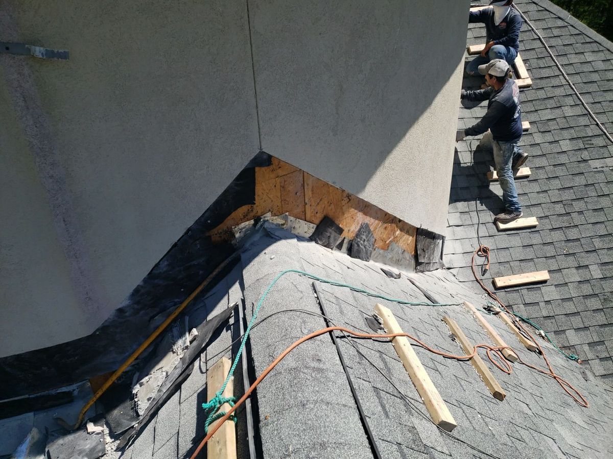 Estate roof aerial — GAF HDZ Mission Brown with custom copper details