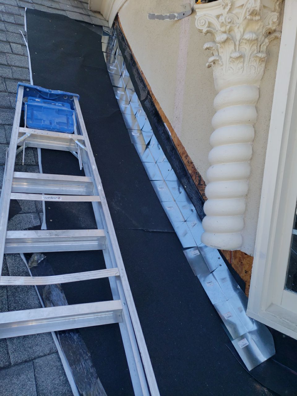 Stucco detail during luxury estate roof and exterior renovation