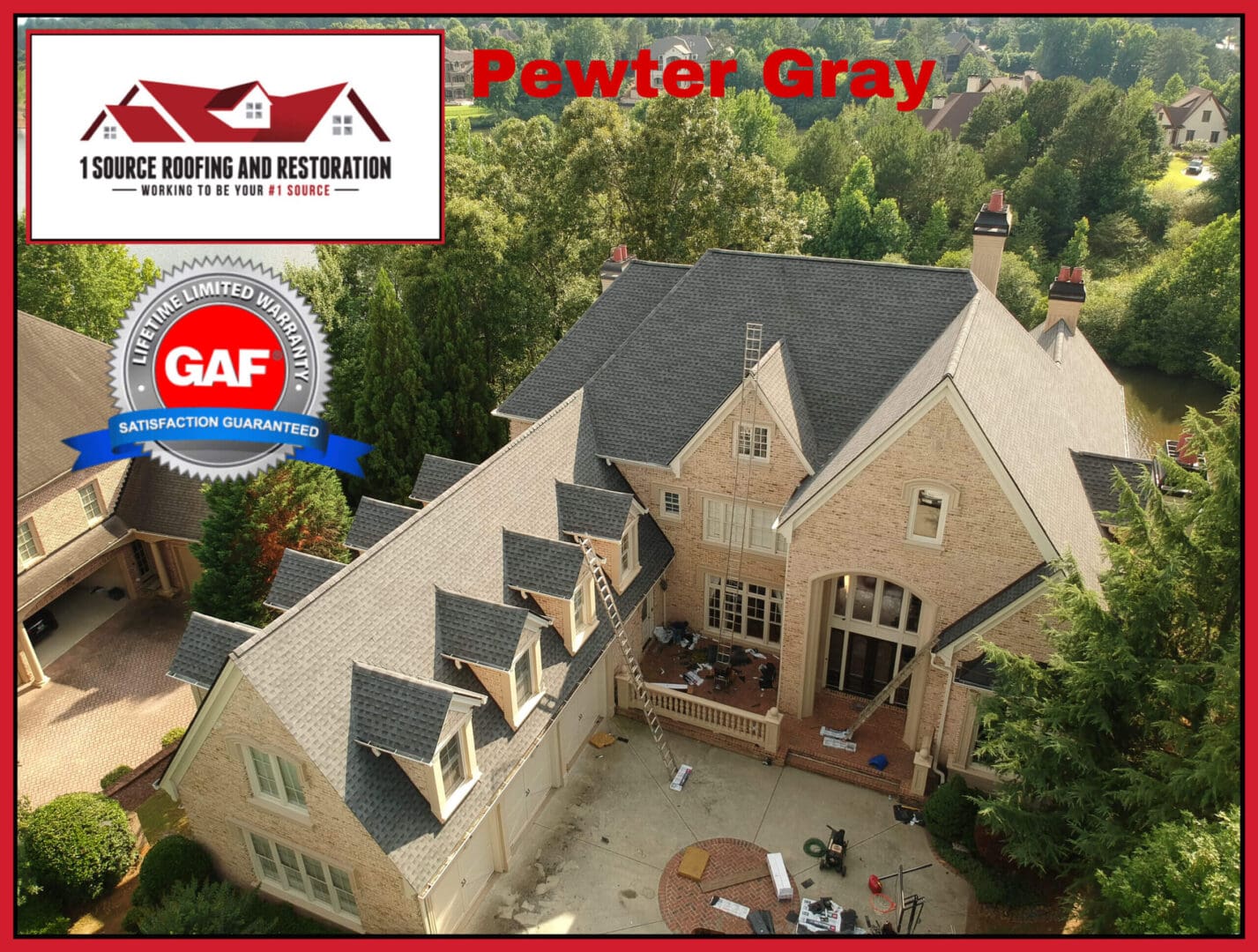 Here's an alt tag for the image: Pewter gray roof on large house.